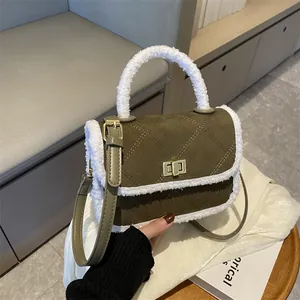Olive green quilted handbag with white faux fur trim and gold metal lock buckle