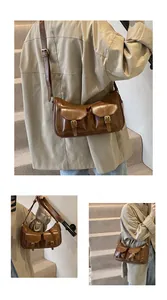 Dettaglio borsa messenger vintage marrone scuro con doppie tasche frontali e pelle lucida
