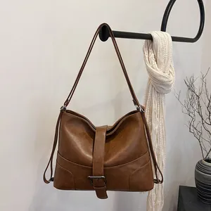Vintage brown leather tote bag with vertical buckle, large capacity shoulder handbag