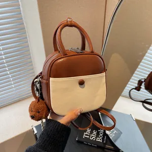 Sac à Dos Multifonctionnel pour Femme Style Coréen Rétro Mini en Cuir PU Sac Bandoulière Avec Pendentif Ours en Peluche Main