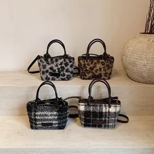 Minimalist wool plaid and leopard print crossbody bags shown in diverse stylish patterns
