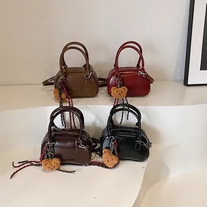 Vintage mini Boston shoulder bag in four colors with cute plush bear charms