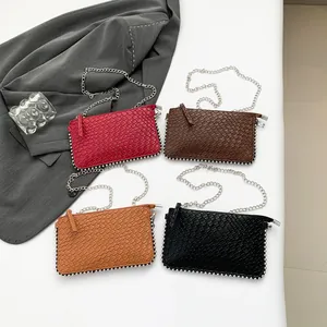 Retro animal-embossed crossbody bags with silver bead trim and chain straps in four colors