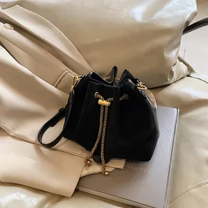Vintage black frosted suede bucket bag for women with gold chain drawstring closure