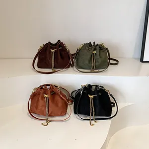 Retro matte bucket bags in four colors with drawstring and gold chain details