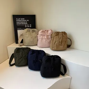 Sac Bandoulière Décontracté en Toile pour Femmes Sac Seau Léger Élégant avec Cordon Sac à Main de Voyage Quotidien