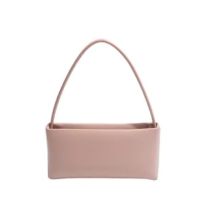 Minimalist light pink baguette shoulder bag in premium faux leather for women