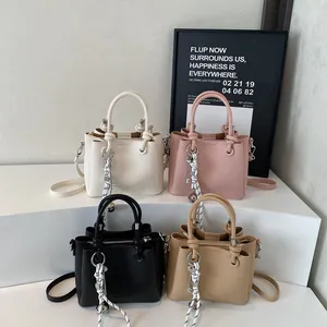 Litchi pattern bucket bag in white, pink, black and khaki with knotted handles