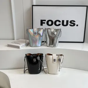 Fashionable bucket chain bag set in metallic silver, holographic, black and white colors