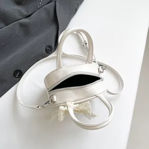 Minimalist cream white round mini handbag with lace bow and detachable shoulder strap