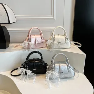 Chic mini boston bags in pink, white, black and silver with elegant pearl bow charms