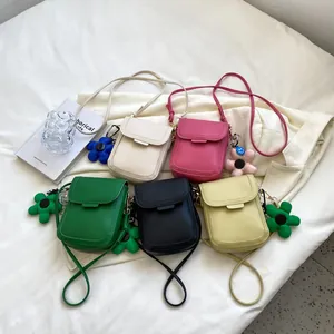 Minimalist mini crossbody phone bags in five pastel colors with cute floral charms