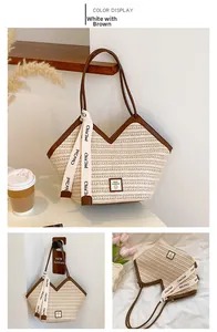 Detailed close-up of beige woven tote bag with brown leather trim and stylish logo patch