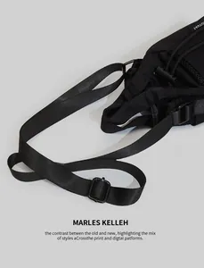 Detail of black nylon bucket bag featuring adjustable strap and mesh pocket