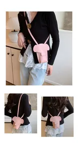 Pink leather elephant shaped mini crossbody bag showing front, side and back views