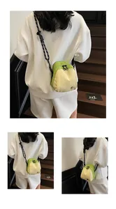 Detail of multi-pocket crossbody bag with green-beige nylon and woven strap