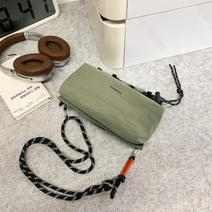 Waterproof Nylon Crossbody Bag Streetwear Multi-Pocket Chest Bag With Braided Rope Strap For Outdoor Hiking Women