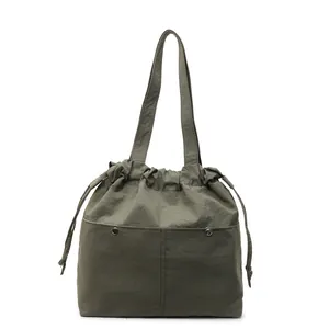 Army green nylon tote bag with drawstring closure and two front pockets for women