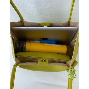 Fluorescent green leather tote bag with pebble texture and large interior space