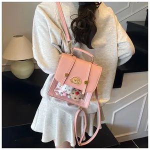 Mini sac à dos en similicuir rose avec fenêtre transparente et petits jouets en peluche