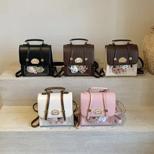 Mini sacs à dos en cuir de style japonais avec broderie cartoon et fenêtres à poupée