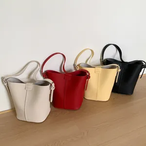 Sacs seaux à motif litchi en blanc cassé, rouge, jaune et noir pour les femmes