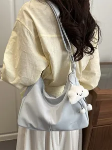 Women Minimalist Nylon Hobo Bag With Cloud Plush Charm Fashion Solid Color Shoulder Crossbody Bag For Daily Travel