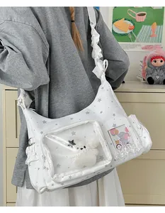 Weiße Ita-Tasche mit Sternmuster, transparentem Sichtfenster und Rüschen-Schultergurt