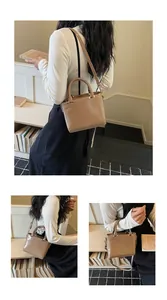 Detailed view of the light brown PU leather square handbag with twin handles and strap