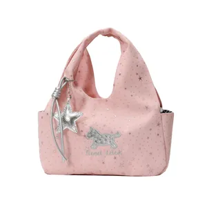 Sac à main rose à motif d'étoiles avec breloque étoile et broderie Good Luck