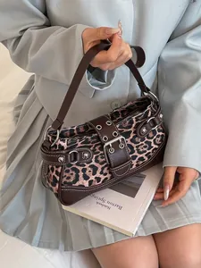 Retro leopard print handbag with silver rivet details and leather belt buckle closure