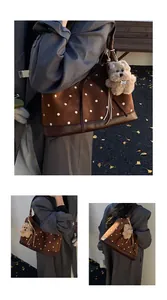 Brown polka dot tote bag detail with suede texture and cute plush puppy charm