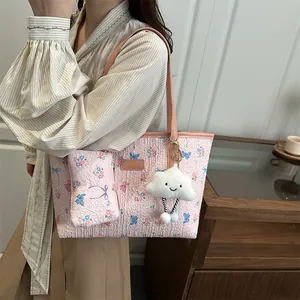 Floral tote bag set with jacquard pattern, leather straps and plush cloud charm