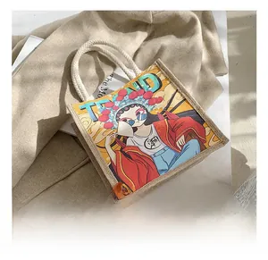 Detail of burlap tote bag with Chinese trend illustration and thick rope handles