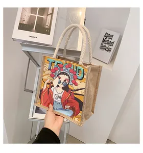 Close-up of jute tote bag with Peking Opera print and white cotton rope handle