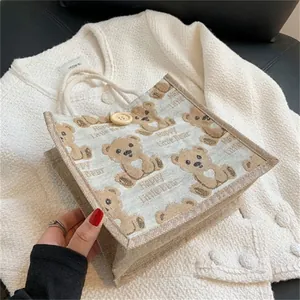 Mini linen tote bag featuring cartoon bear patterns and premium rope handles