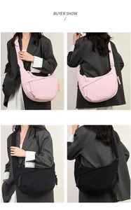 Detail shots of corduroy crescent crossbody bags in pink and black colors for women