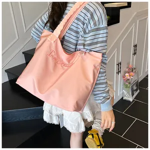 Pink large-capacity tote bag with ruffled shoulder straps and ice cream embroidery