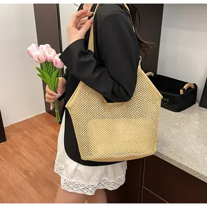 Detail of hollow woven tote bag in beige with large capacity for women's daily commute