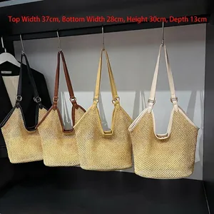 Hollow out straw tote bag in four colors with dimensions 37x28x30cm and leather straps