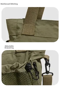 Détails du sac fourre-tout vert armée avec coutures renforcées et cordon de serrage