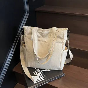 Borsa tote minimalista beige grande capacità in tela con tracolla regolabile e tasche