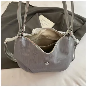 Gray wood-grain textured large tote bag with zipper and beige lining for women