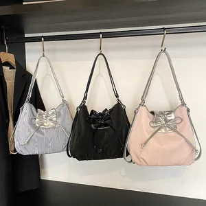 Minimalist large capacity tote bags with wood grain texture and bow detail in three colors