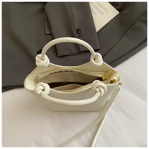 Secchiello bianco motivo a serpente con manico a nodo e cerniera dorata