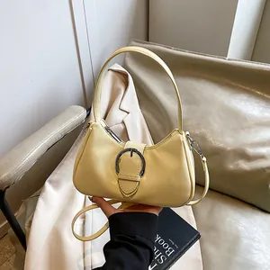 Borsa sottobraccio a mezzaluna giallo chiaro retrò con fibbia in metallo e tracolla rimovibile