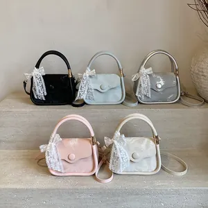 Chic marbled crossbody handbags with lace bow details in five soft pastel colors