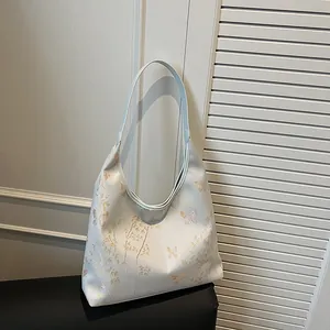 Beige Hobo underarm bag with elegant Chinese bamboo and butterfly print patterns