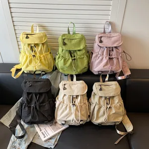 Nylon drawstring backpack for women in six colors including yellow, green and pink