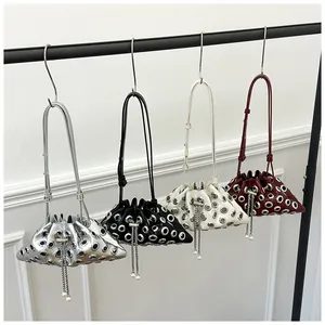 Punk grommet bucket bags with pearl chains in silver, black, beige, and burgundy